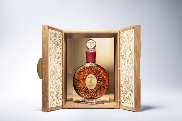 Secondary packaging open of a Cognac Bottle on a white background